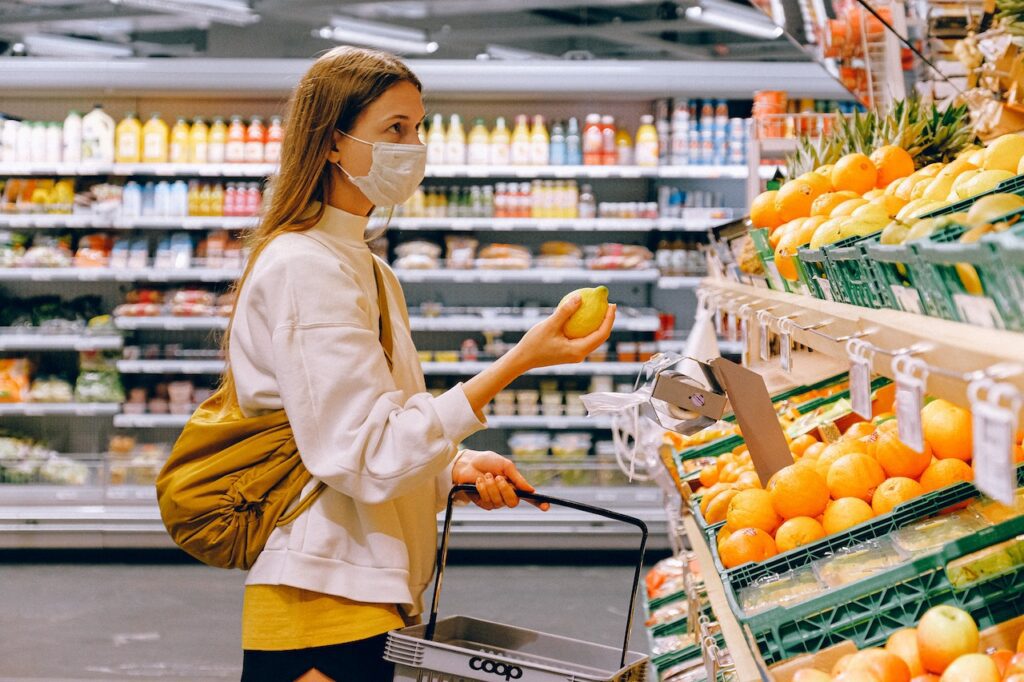 a lady buying lemons